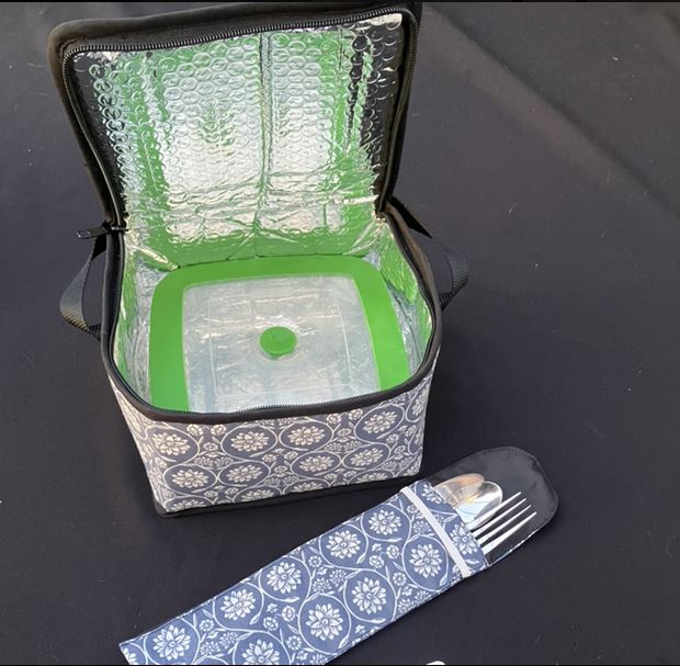 Lunchbag isotherme avec range-couverts imperméable assorti