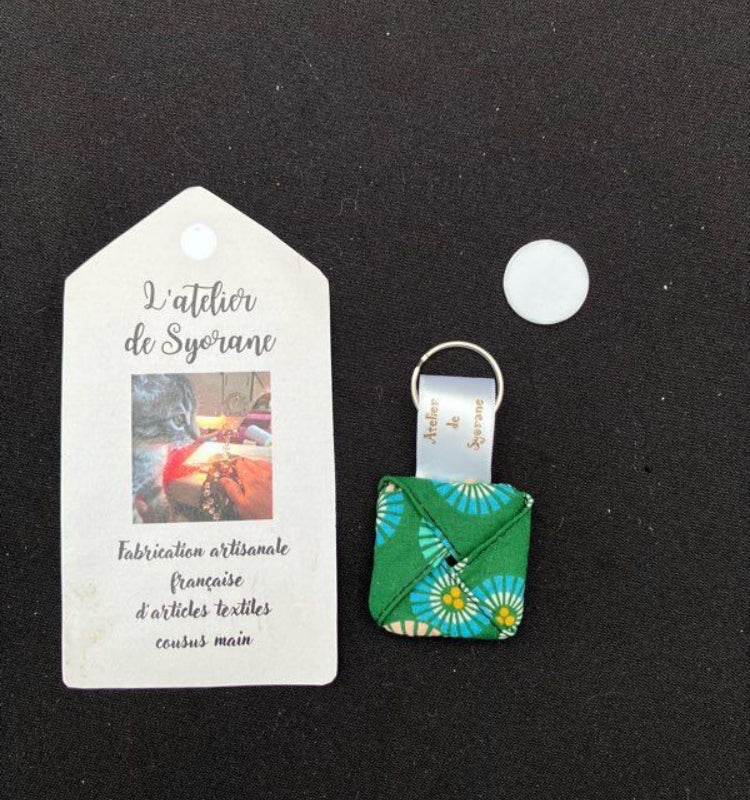 Porte-clés astucieux range jeton de caddie