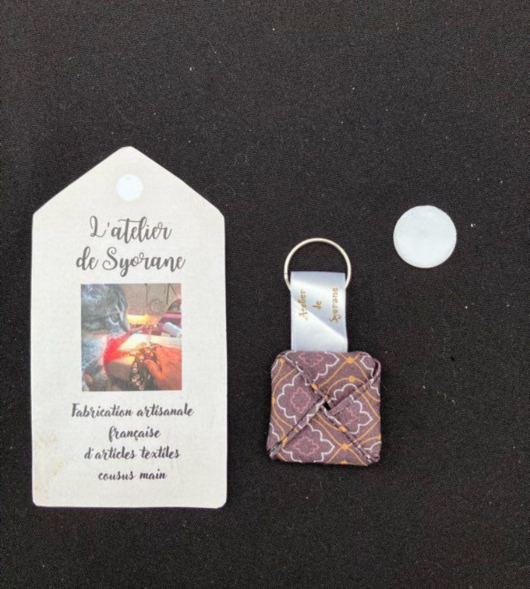 Porte-clés astucieux range jeton de caddie