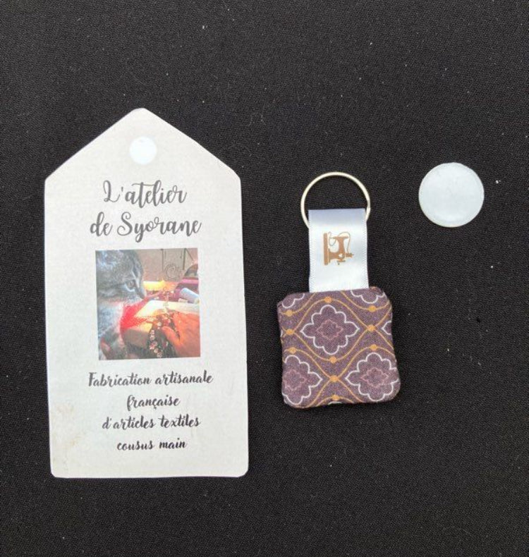 Porte-clés astucieux range jeton de caddie