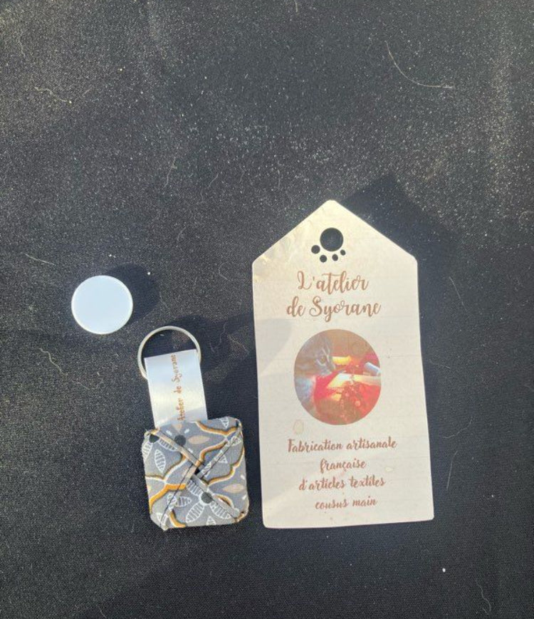 Porte-clés astucieux range jeton de caddie