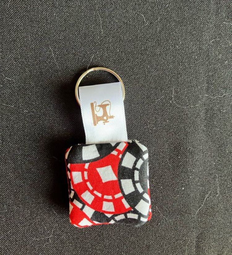 Porte-clés astucieux range jeton de caddie